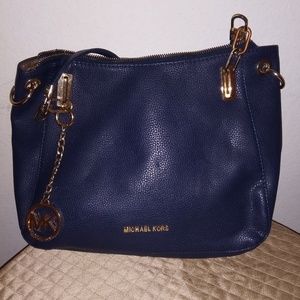Blue and gold handbag